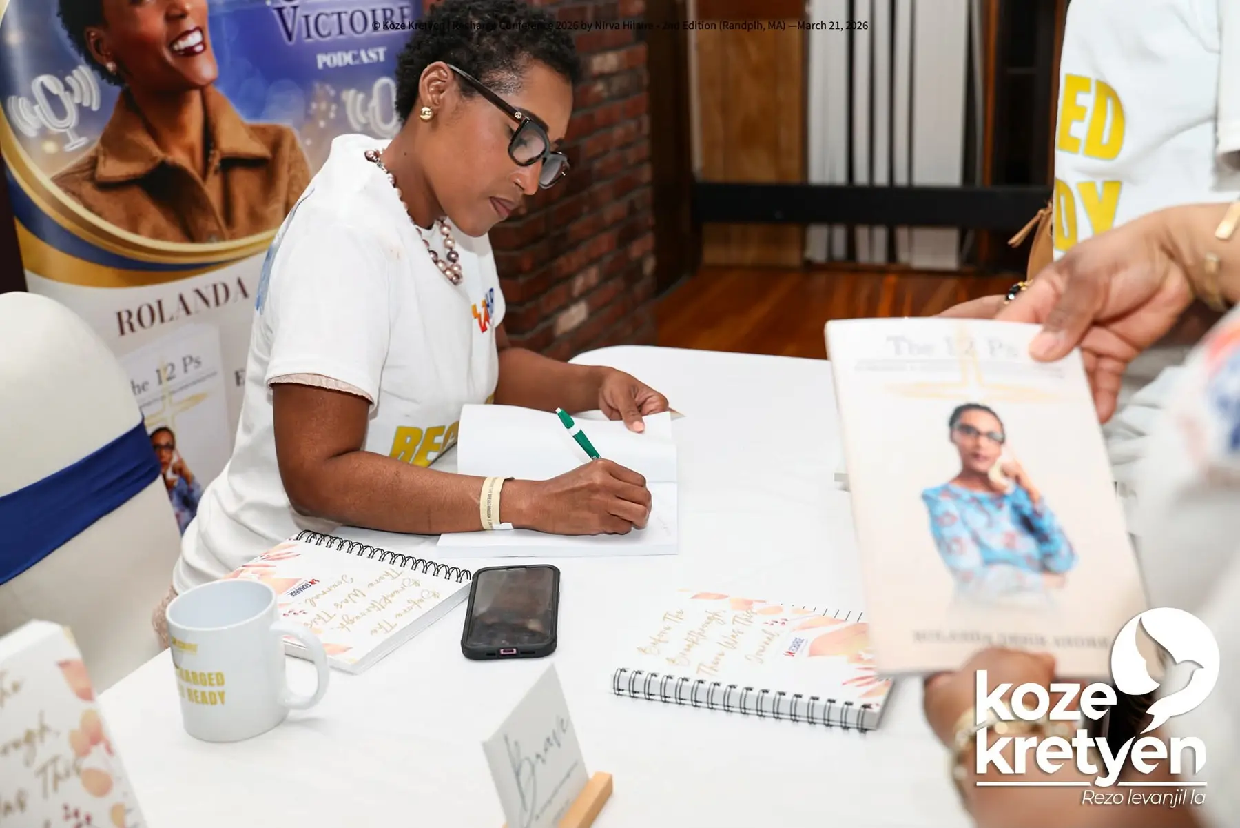 Rolanda signing The 12 P's in Randolph